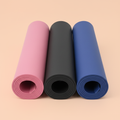 Yoga Mat on soft peach background